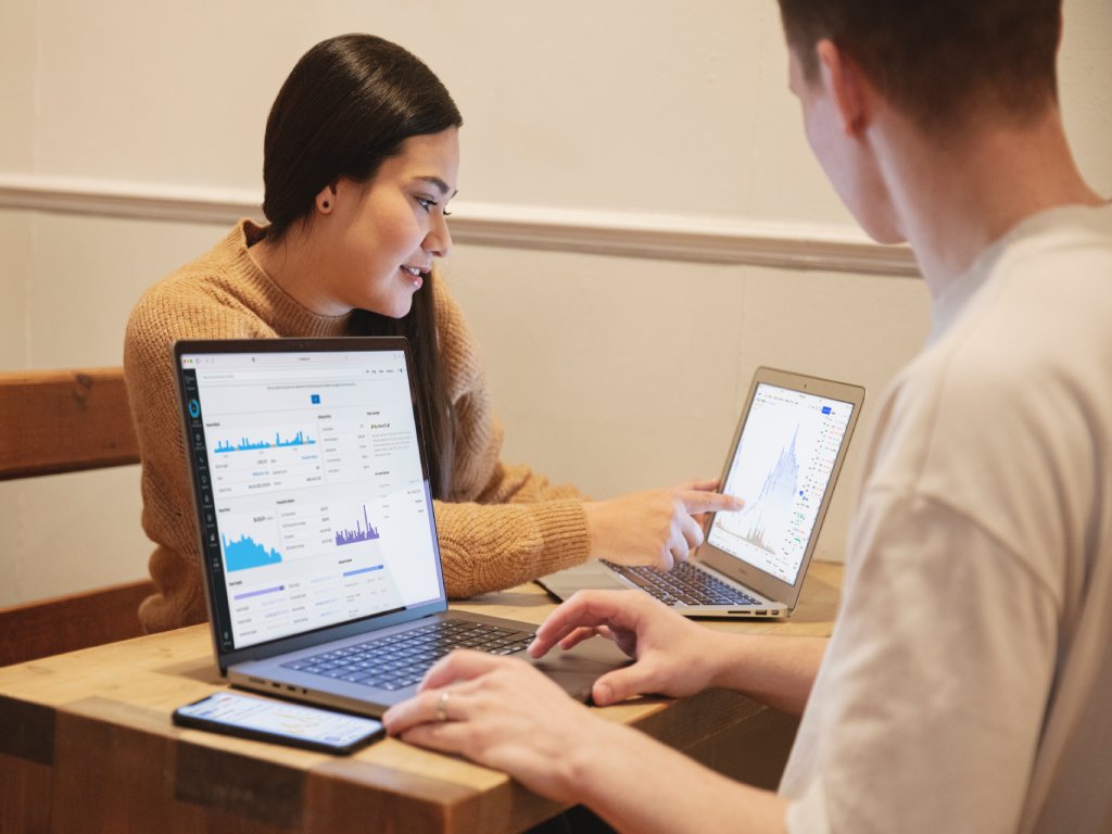 Man and woman working on the laptops