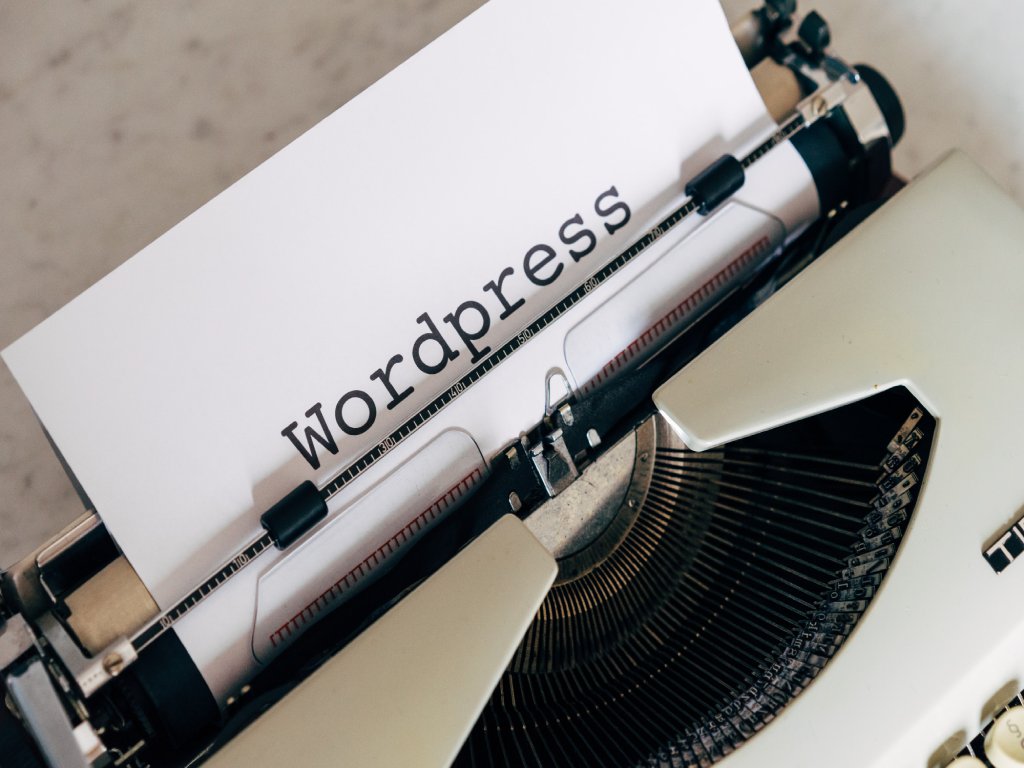 Typewriter with the word WordPress written on it
