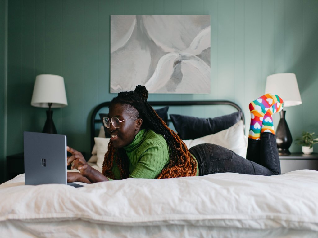 Woman watching programs on laptop