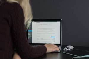 Woman writes a blog on WordPress