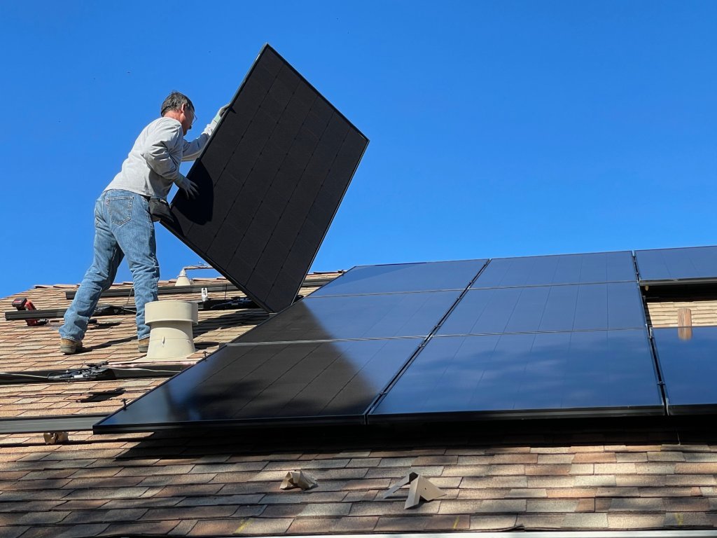 Solar panels and worker