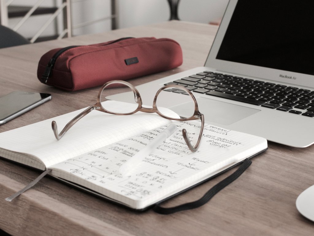 Laptop, notebook and glasses