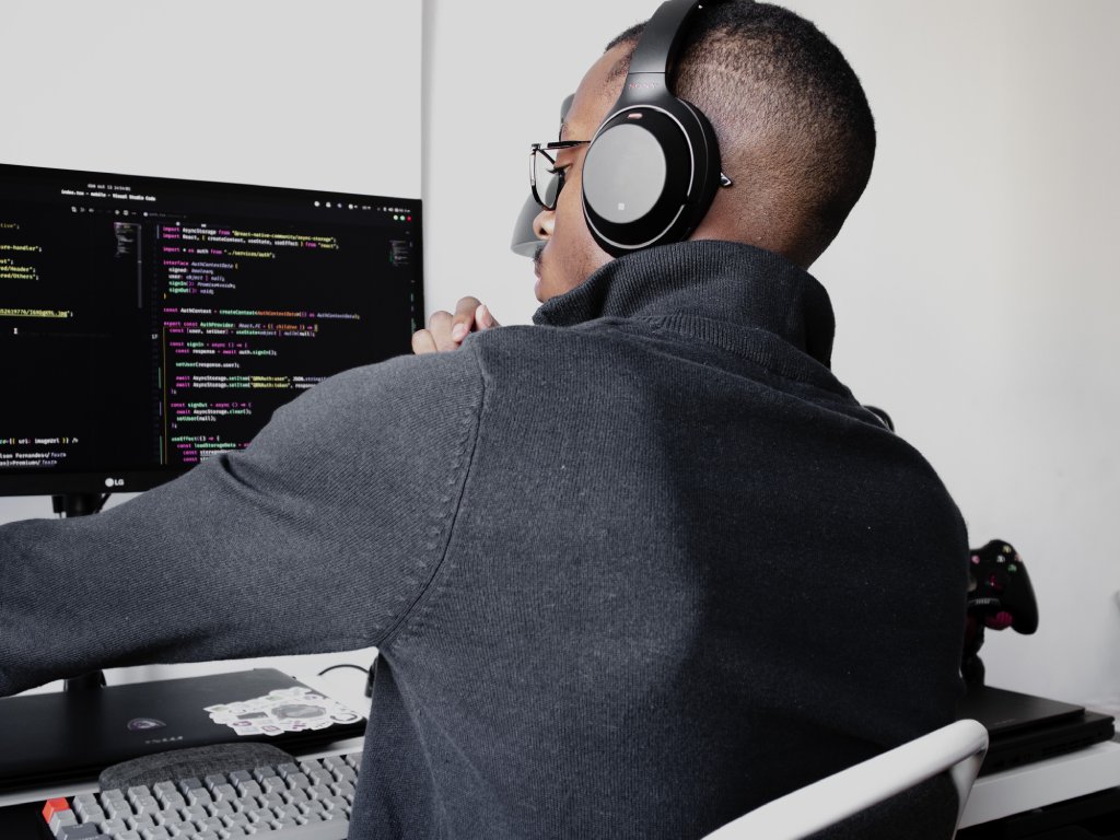 Programmer with a headphones